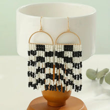Cece Black and White Tassel Earrings