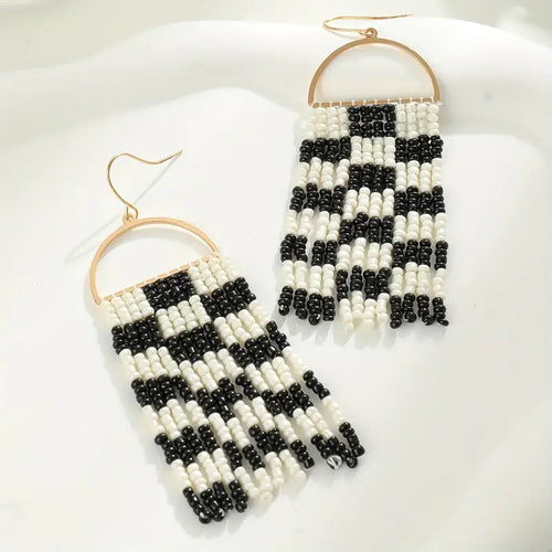 Cece Black and White Tassel Earrings