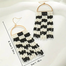 Cece Black and White Tassel Earrings